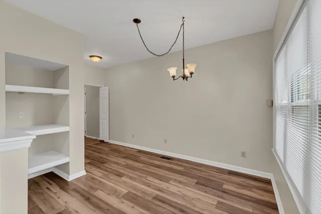 a view of a room with rack on the wall