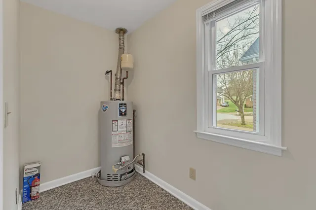 a view of a house with a door and stairs