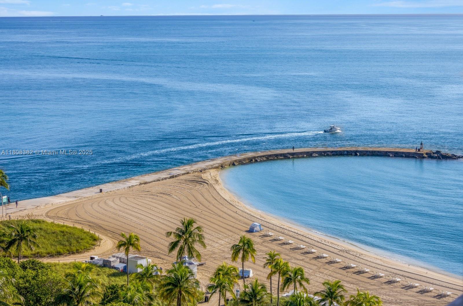 10225 Collins Avenue, Unit 604 Bal Harbour, FL 33154 - Photo 21 of 37 a view of a swimming pool