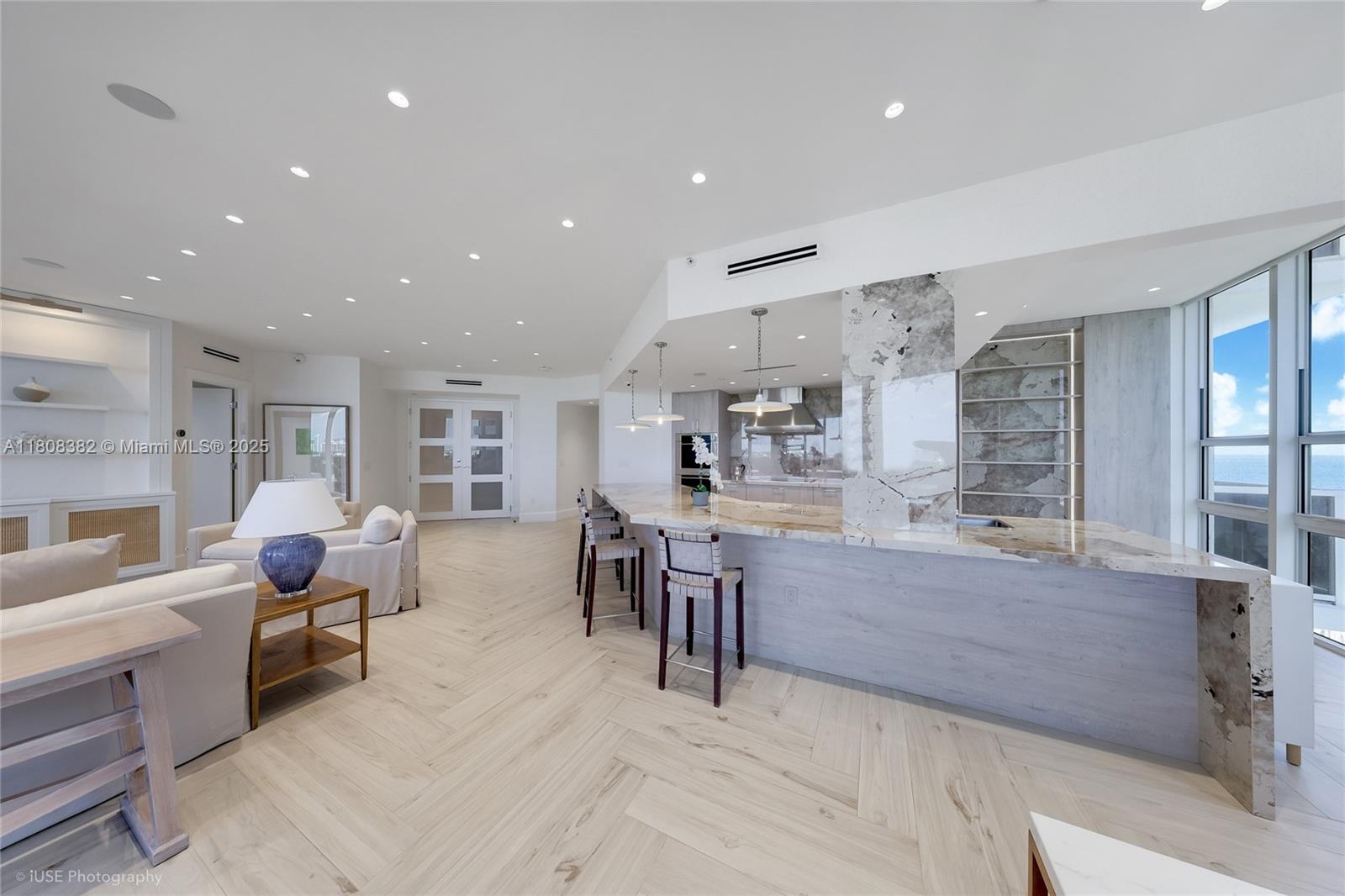 10225 Collins Avenue, Unit 604 Bal Harbour, FL 33154 - Photo 3 of 37 a large room with cabinets