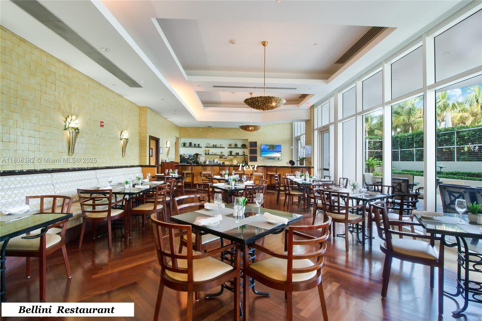 10225 Collins Avenue, Unit 604 Bal Harbour, FL 33154 - Photo 31 of 37 a view of a dining room with furniture window and outside view