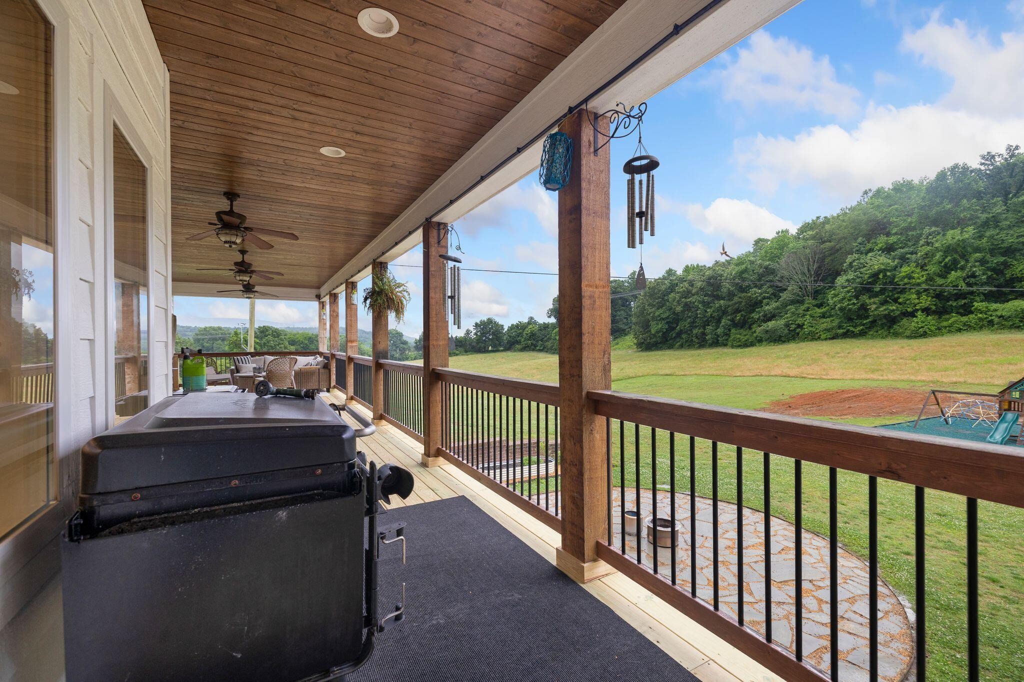 6866 Daus Mountain Road Whitwell, TN 37397 - Photo 34 of 49 a view of balcony with furniture