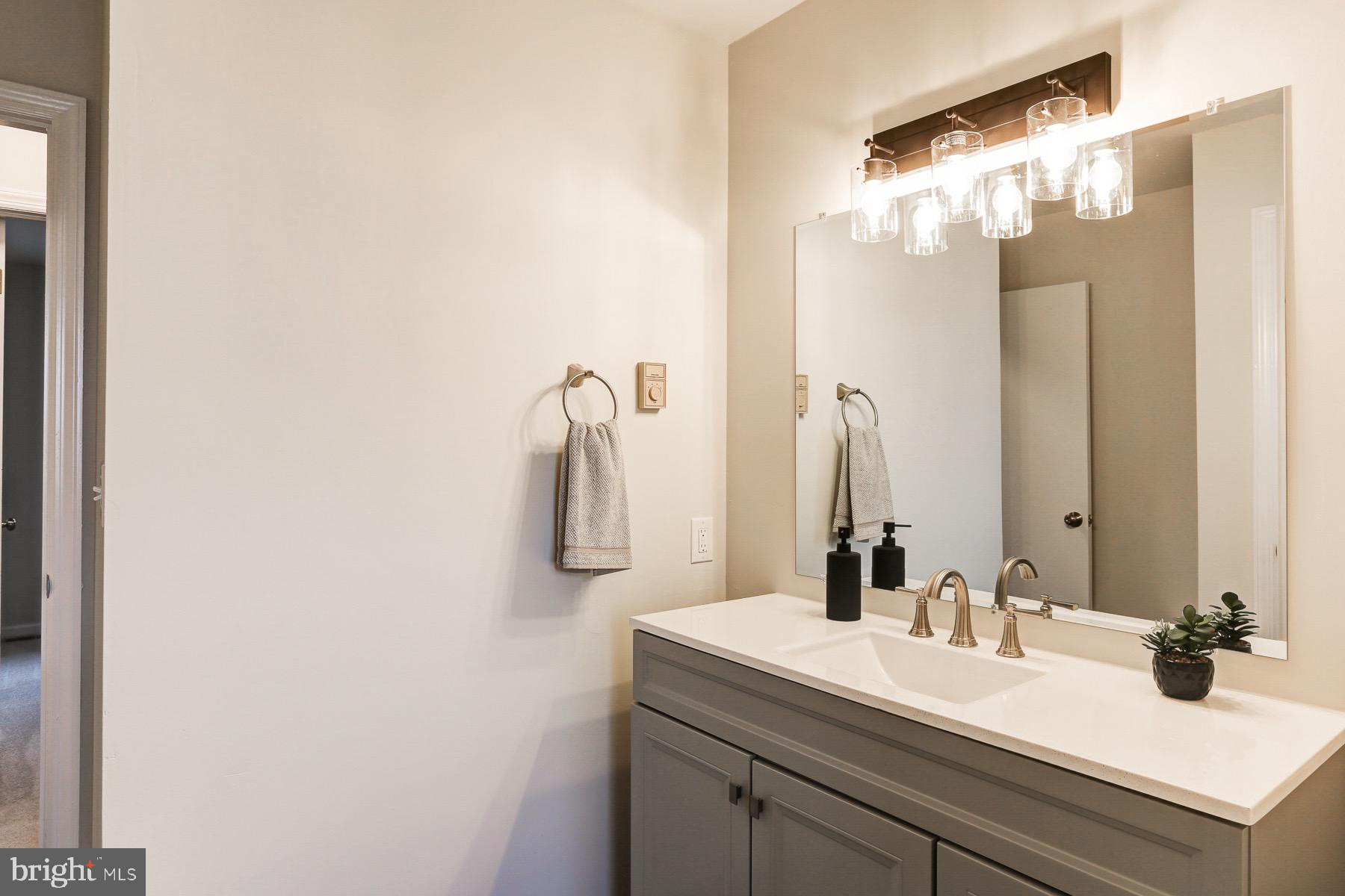58 Foreman Road Elizabethtown, PA 17022 - Photo 19 of 31 a bathroom with a sink and a mirror