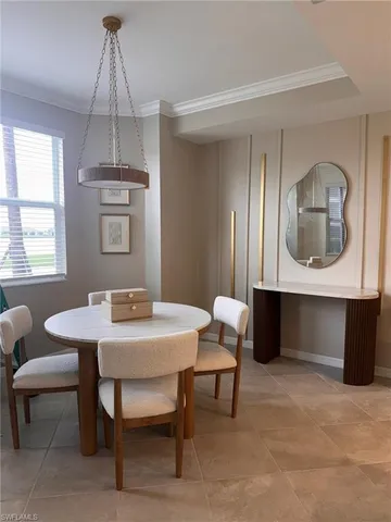 a view of a livingroom with furniture and window