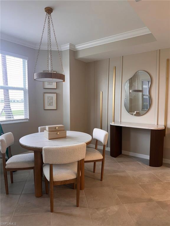 5583 Double Eagle Circle, Unit 4112 Ave Maria, FL 34142 - Photo 1 of 36 a view of a livingroom with furniture and window