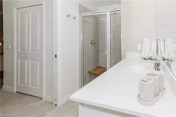 a view of a swimming pool with outdoor seating