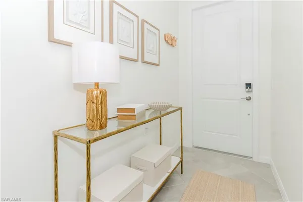 a dining room with furniture window and wooden floor