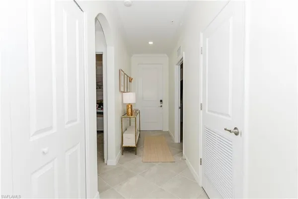 a view of a dining room with furniture and window