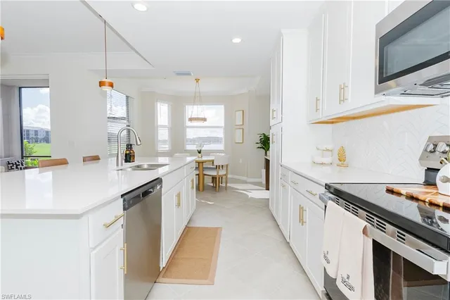 a living room with furniture and a couch