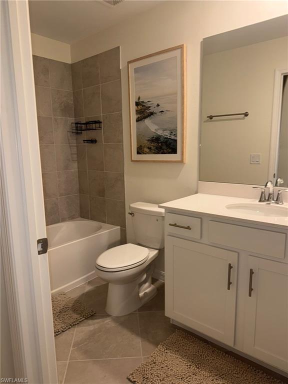 5583 Double Eagle Circle, Unit 4112 Ave Maria, FL 34142 - Photo 8 of 36 a bathroom with a sink a toilet and shower