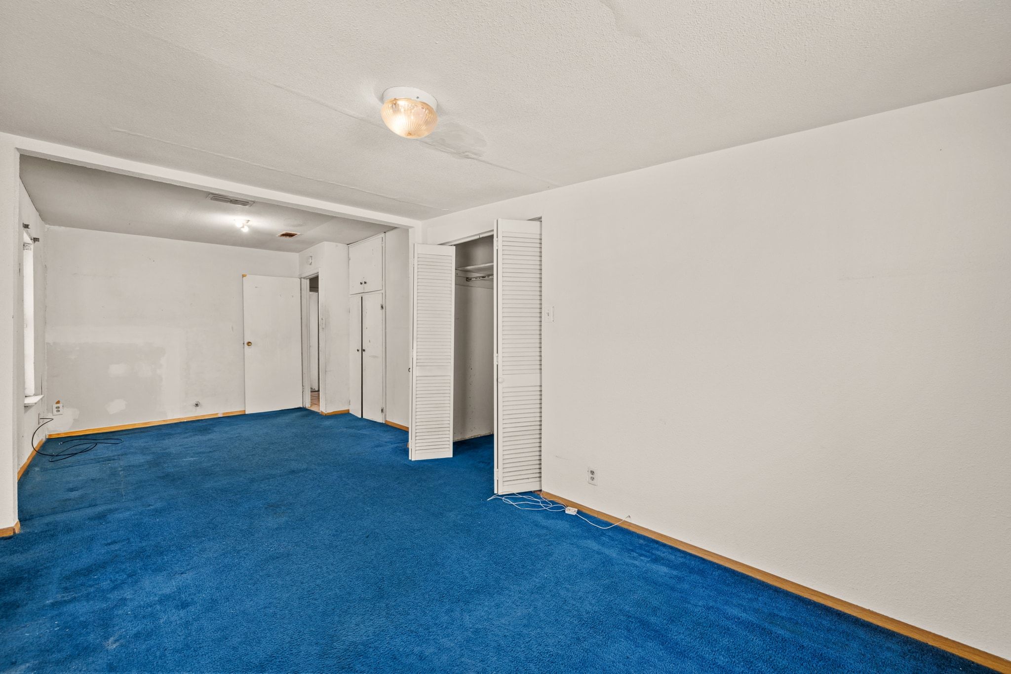 1114 Richardine Avenue Austin, TX 78721 - Photo 17 of 27 a view of empty room with wooden floor