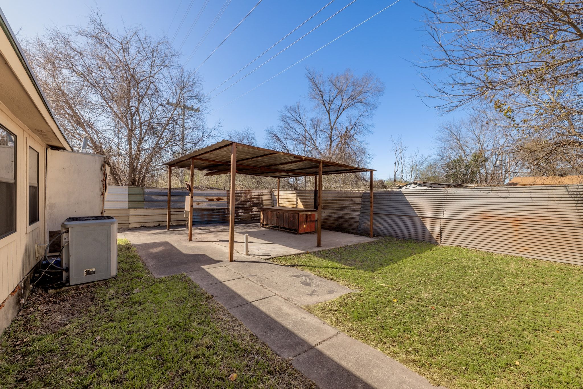 1114 Richardine Avenue Austin, TX 78721 - Photo 24 of 27 a view of a backyard with sitting area
