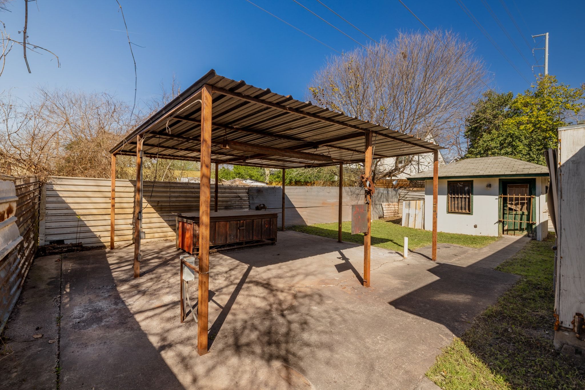1114 Richardine Avenue Austin, TX 78721 - Photo 26 of 27 a view of a backyard with sitting area