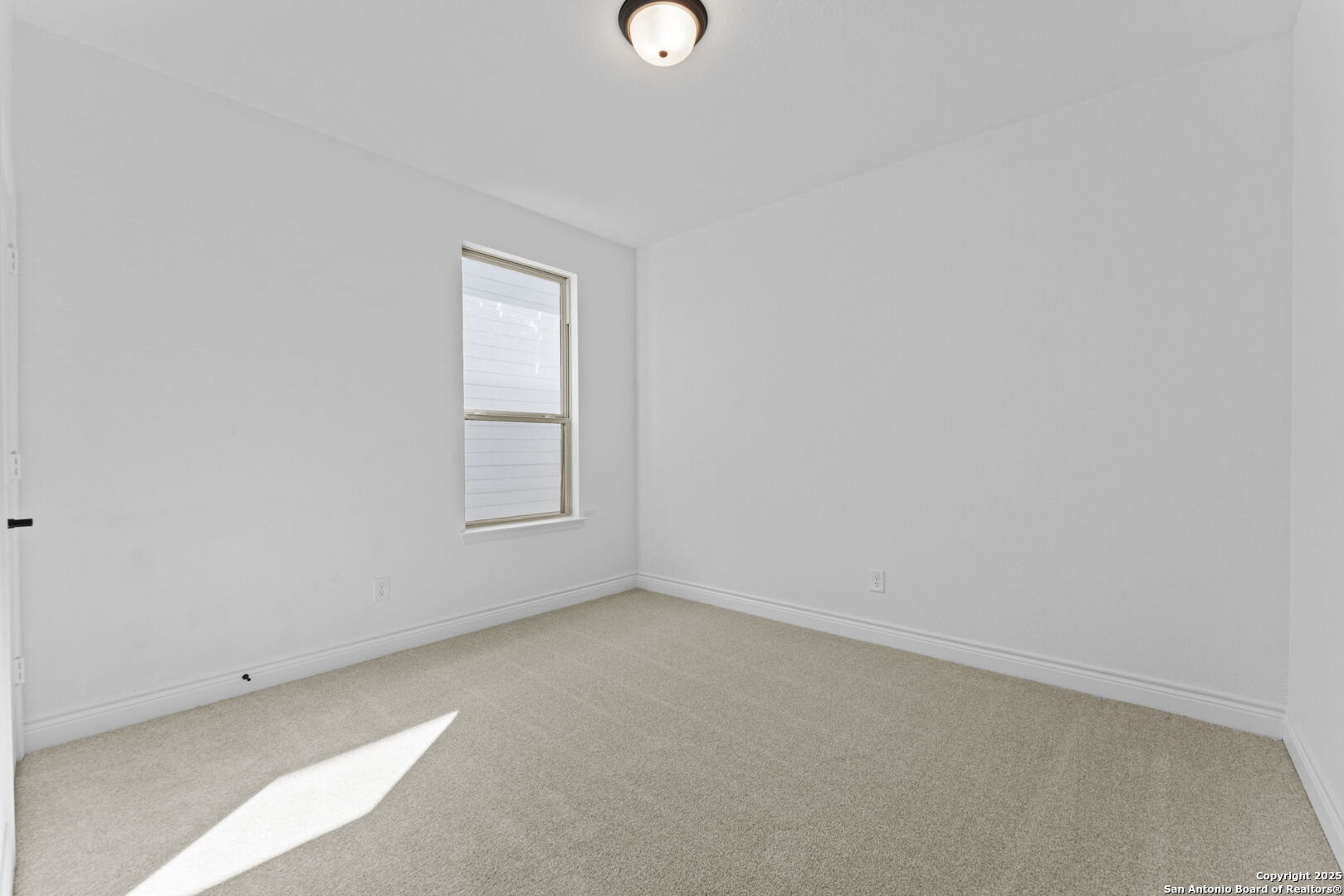 4014 Paddock Trail Seguin, TX 78155 - Photo 17 of 27 a view of an empty room with a window
