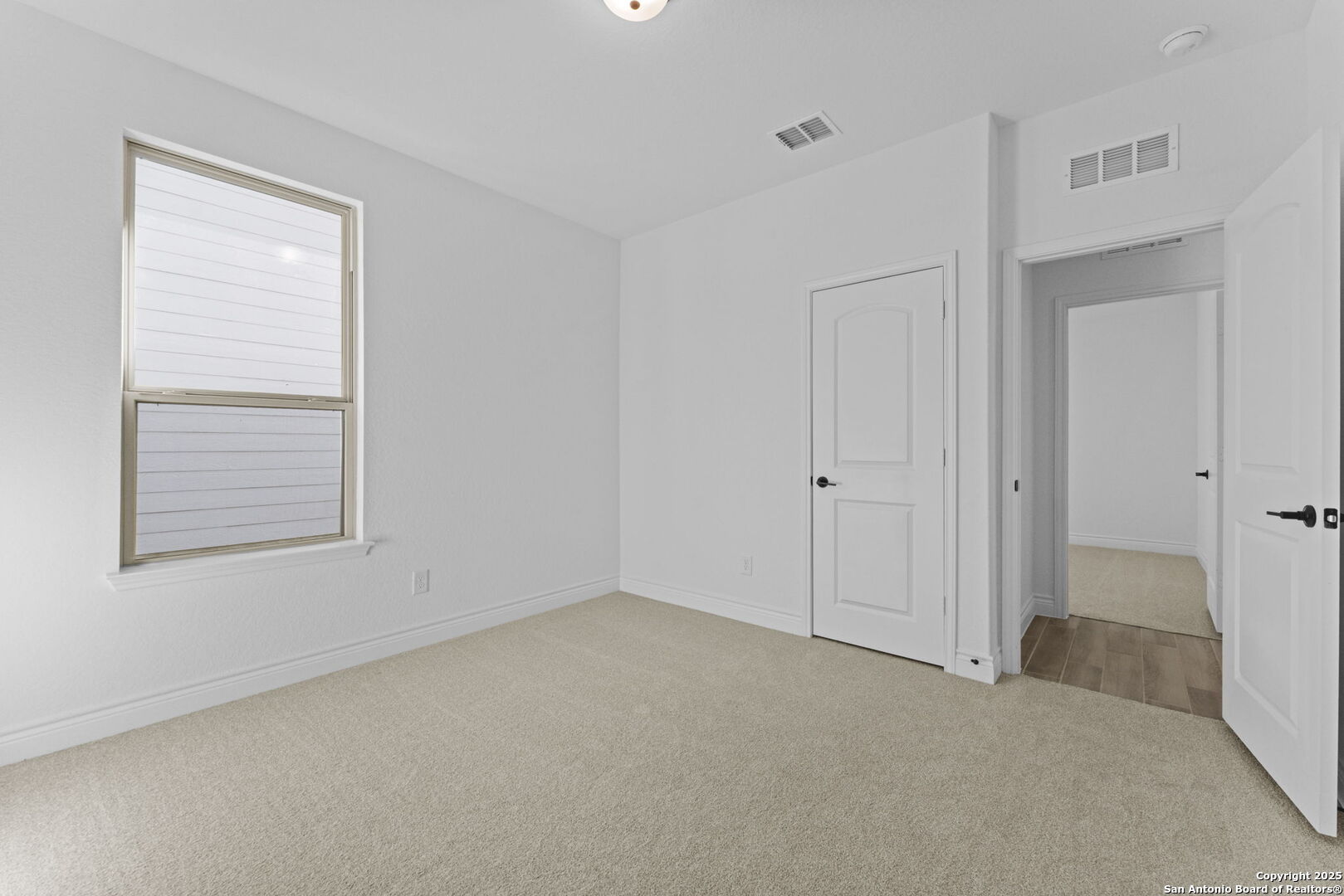 4014 Paddock Trail Seguin, TX 78155 - Photo 20 of 27 a view of an empty room with a window