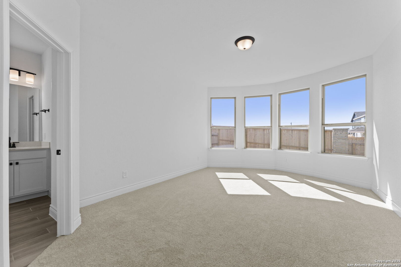 4014 Paddock Trail Seguin, TX 78155 - Photo 21 of 27 a view of an empty room with a window
