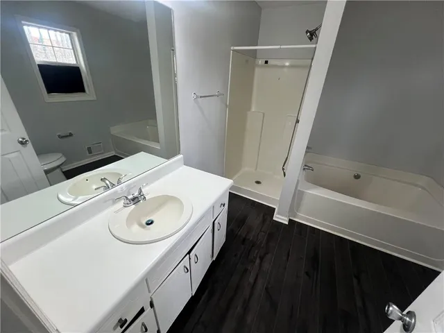 a bathroom with a sink and a bathtub