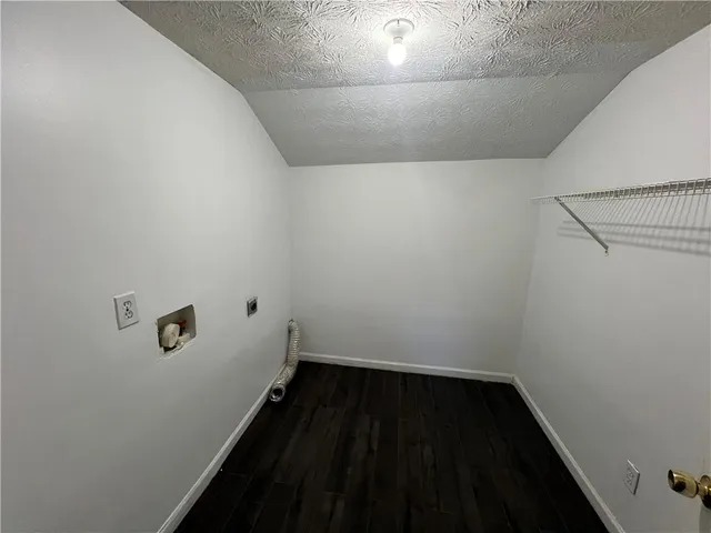 a view of a closet in a bathroom