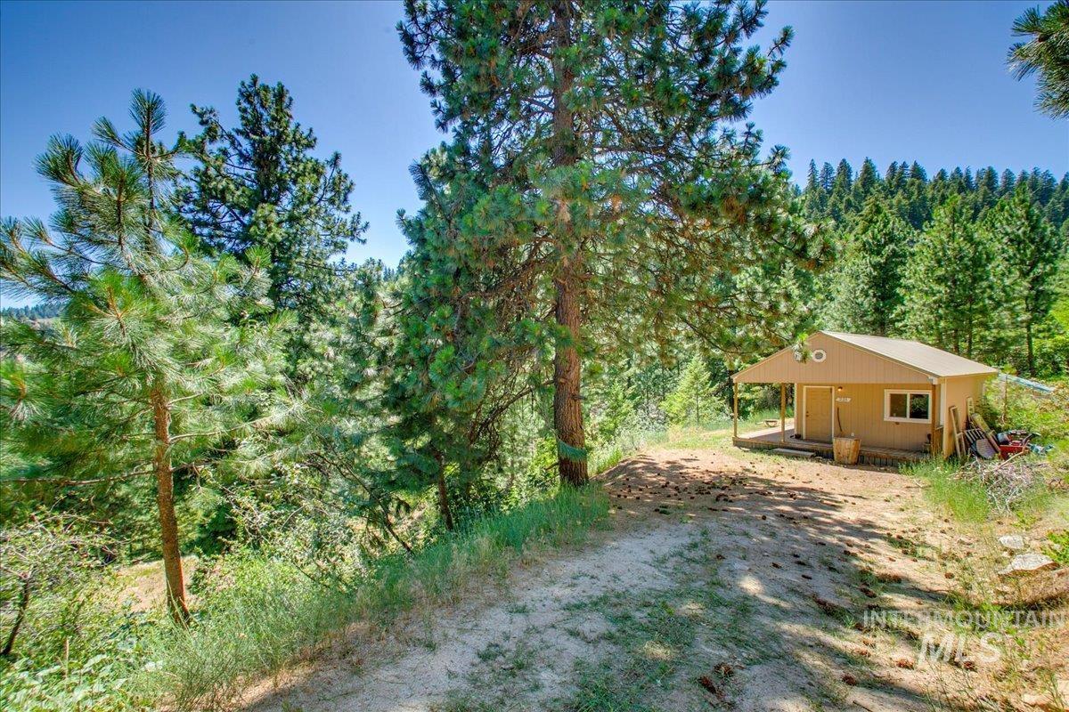 221 Tollgate Road Boise, ID 83716 - Photo 30 of 32 View of yard featuring a view of trees