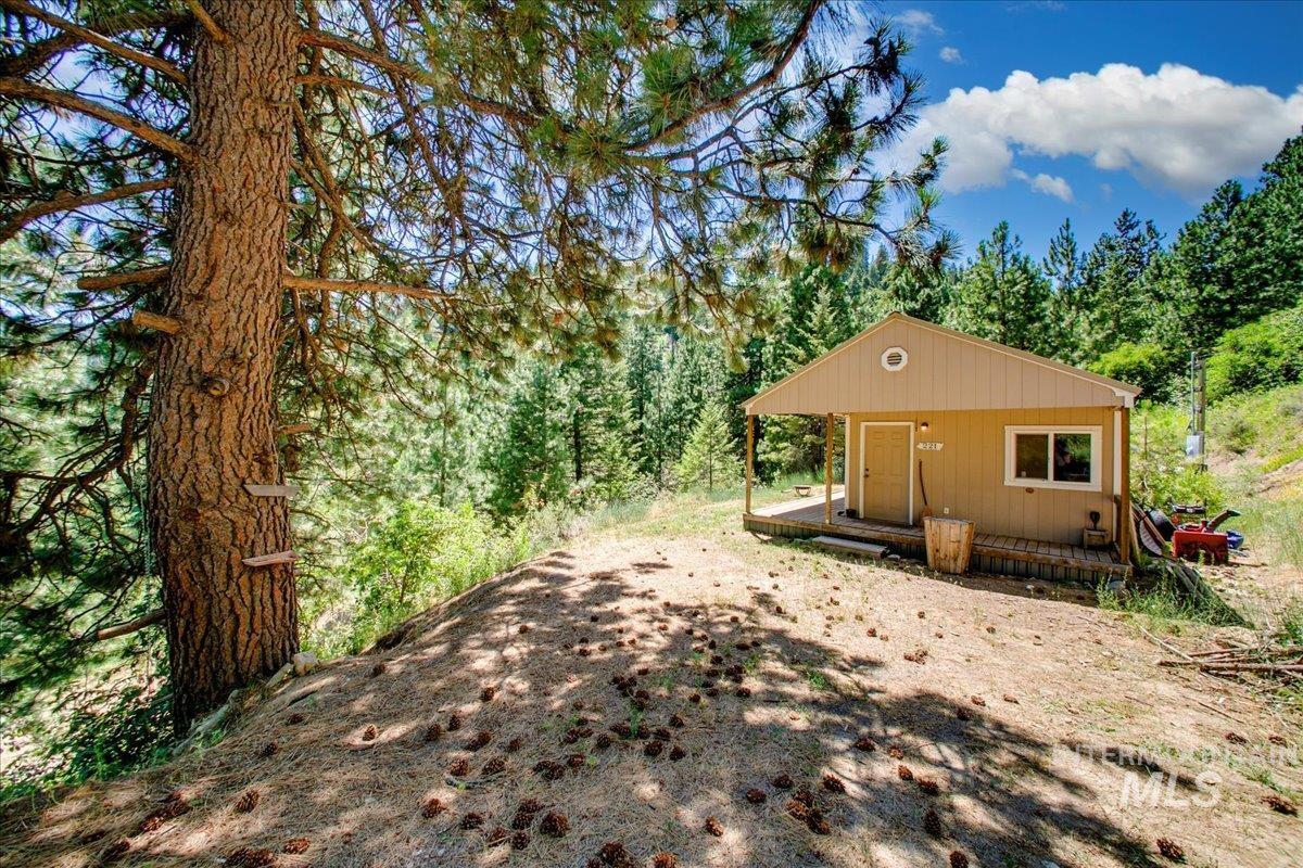 221 Tollgate Road Boise, ID 83716 - Photo 31 of 32 View of front of property featuring a forest view