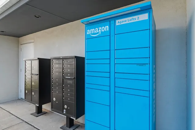 a view of a house with backyard and a tree