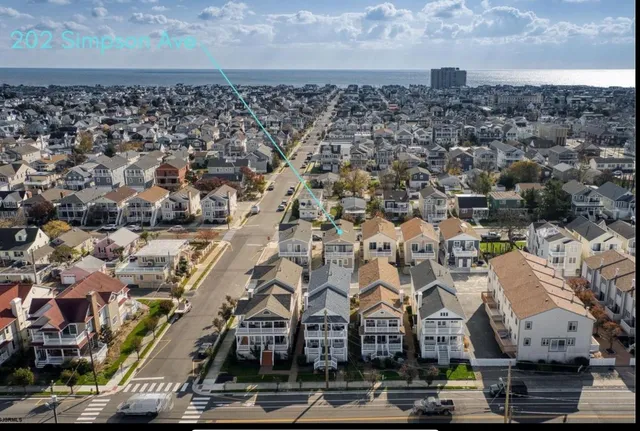 an aerial view of residential building with parking space