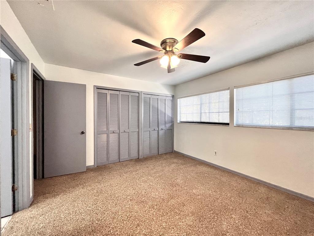 5830 Southwest 9th Place Gainesville, FL 32607 - Photo 14 of 22 a view of an empty room with a window