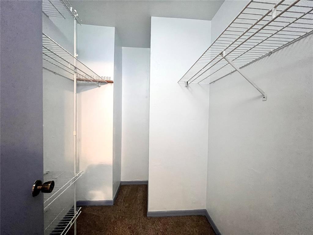 5830 Southwest 9th Place Gainesville, FL 32607 - Photo 16 of 22 a view of small space with racks on the wall