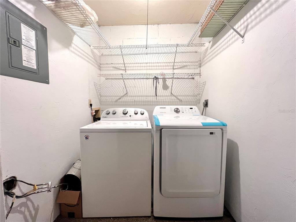 5830 Southwest 9th Place Gainesville, FL 32607 - Photo 17 of 22 a utility room with dryer and washer
