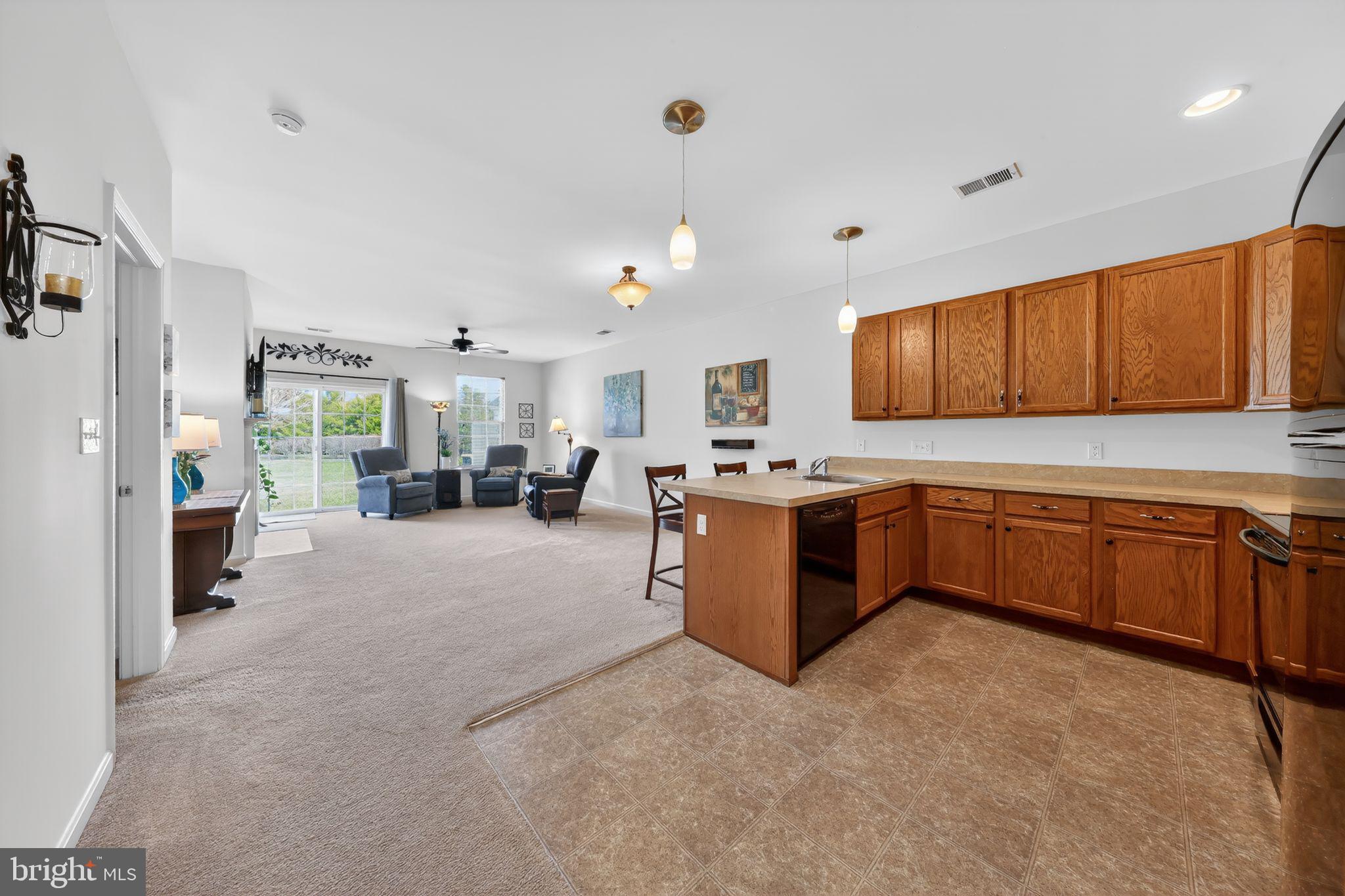 39 Thistle Court Smyrna, DE 19977 - Photo 16 of 31 Kitchen to living room