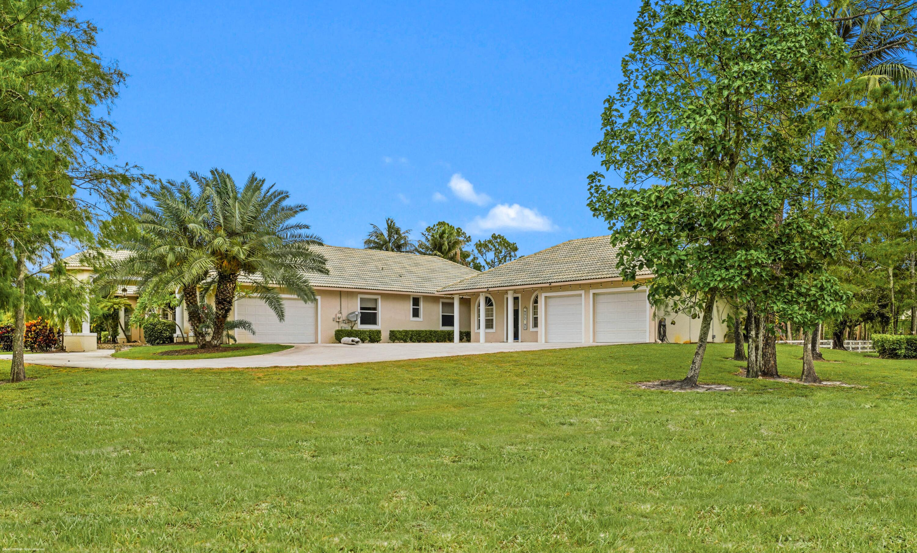 2560 Buck Ridge Trail Loxahatchee, FL 33470 - Photo 9 of 65 South Side View & Guest House