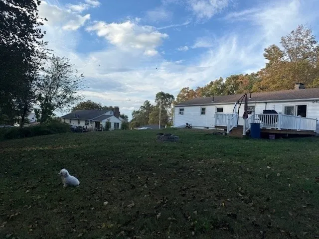 a view of a house with a big yard