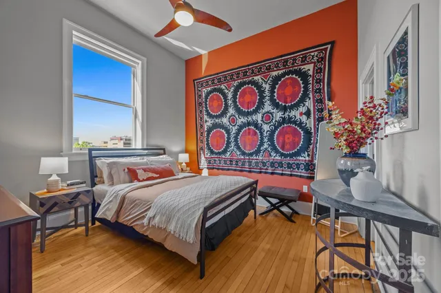 a bedroom with a bed and furniture