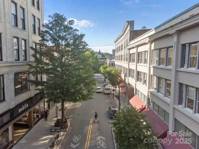 a view of a city with tall buildings