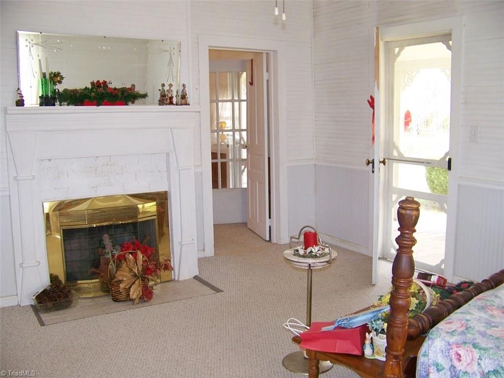 630 Turkey Ford Road Dobson, NC 27017 - Photo 12 of 23 Fireplace in Master Bedoom
