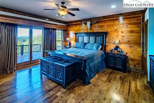 a bed room with a bed and a window