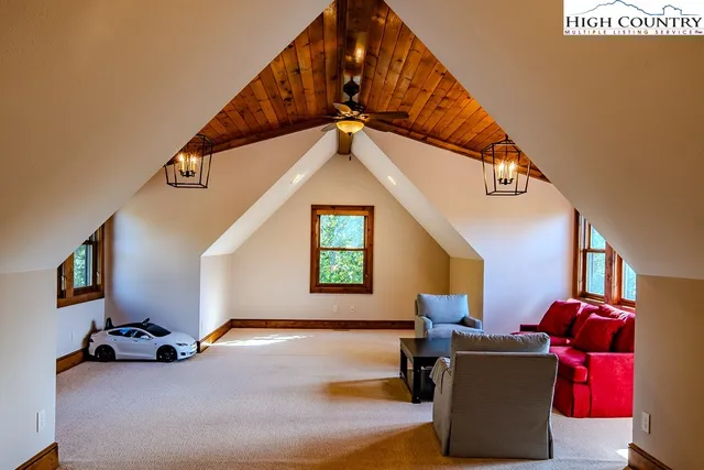 a workspace with furniture and stairs