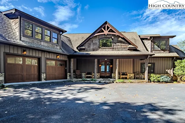 a front view of a building with small garden