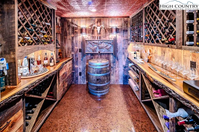 walk in closet with wooden floor