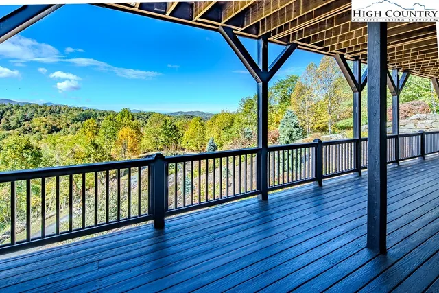 a view of porch with a swimming pool