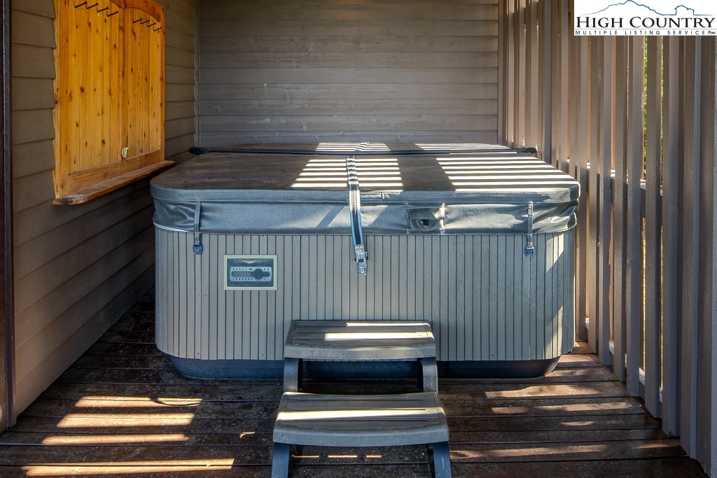 236 Stack Rock Road Elk Park, NC 28622 - Photo 32 of 50 a view of a patio with a table and chairs