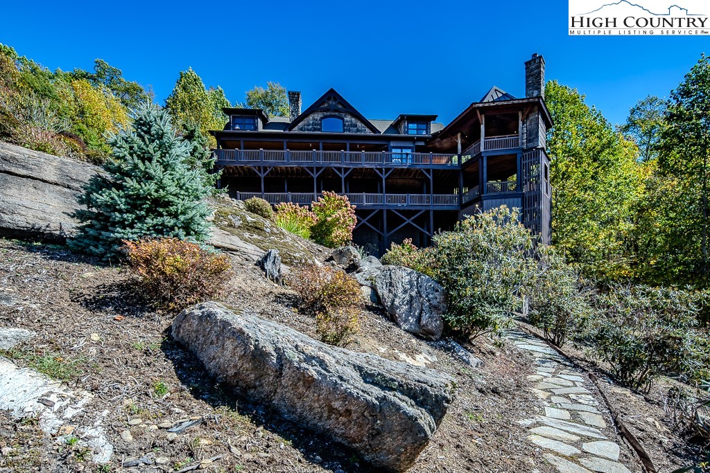 236 Stack Rock Road Elk Park, NC 28622 - Photo 38 of 50 a front view of a house with a yard