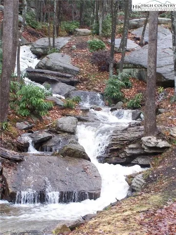 a view of a backyard of the house
