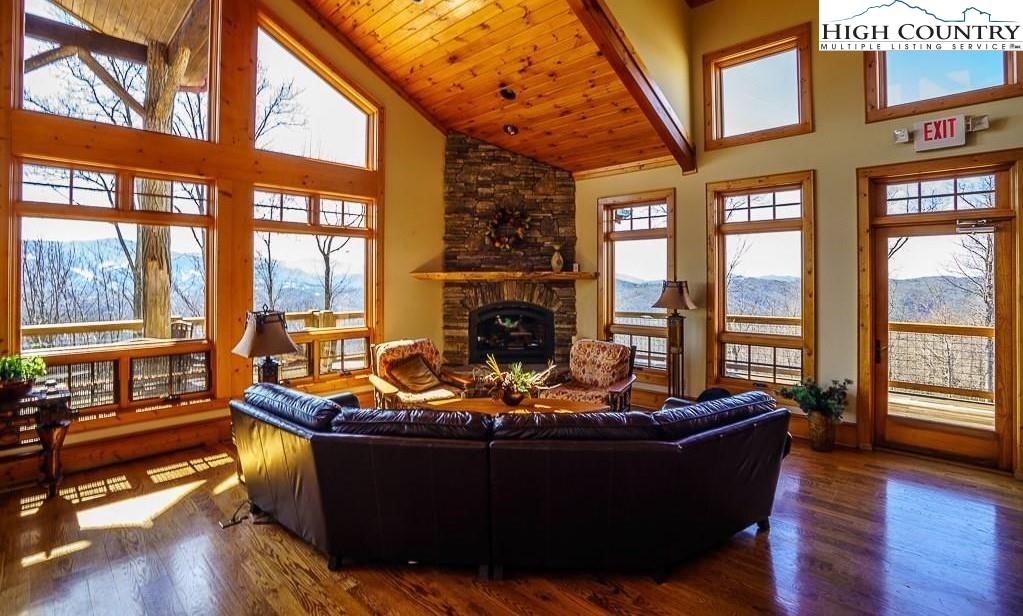 236 Stack Rock Road Elk Park, NC 28622 - Photo 48 of 50 a living room with large windows