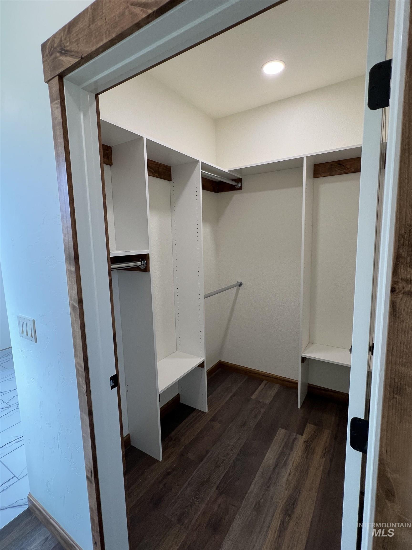 137 Angus Ranch Grangeville, ID 83530 - Photo 23 of 49 Spacious closet with dark wood finished floors