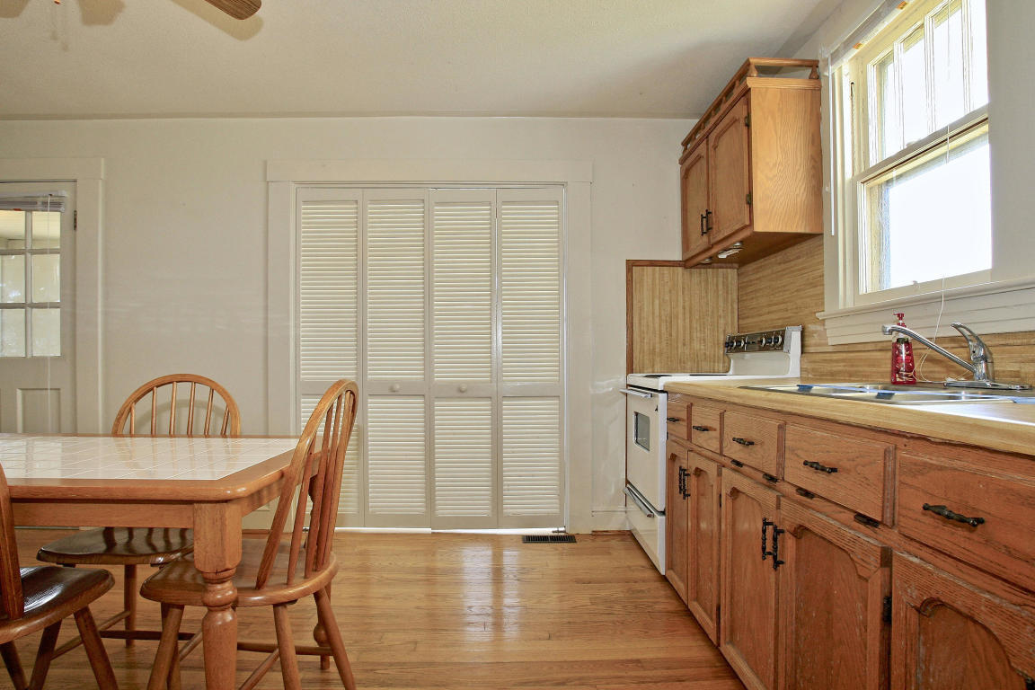 390 Kemp Ford Road Union Hall, VA 24176 - Photo 12 of 47 a view of a kitchen area with furniture and wooden floor