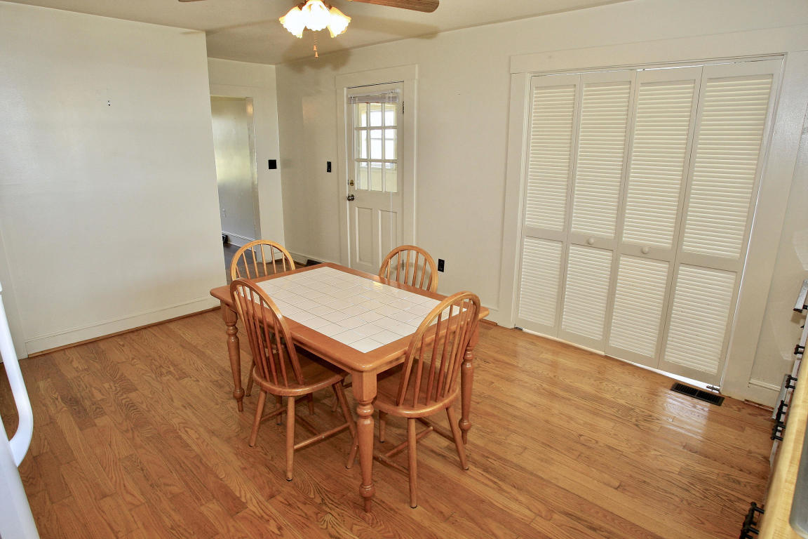 390 Kemp Ford Road Union Hall, VA 24176 - Photo 13 of 47 a view of a dining room with furniture and wooden floor