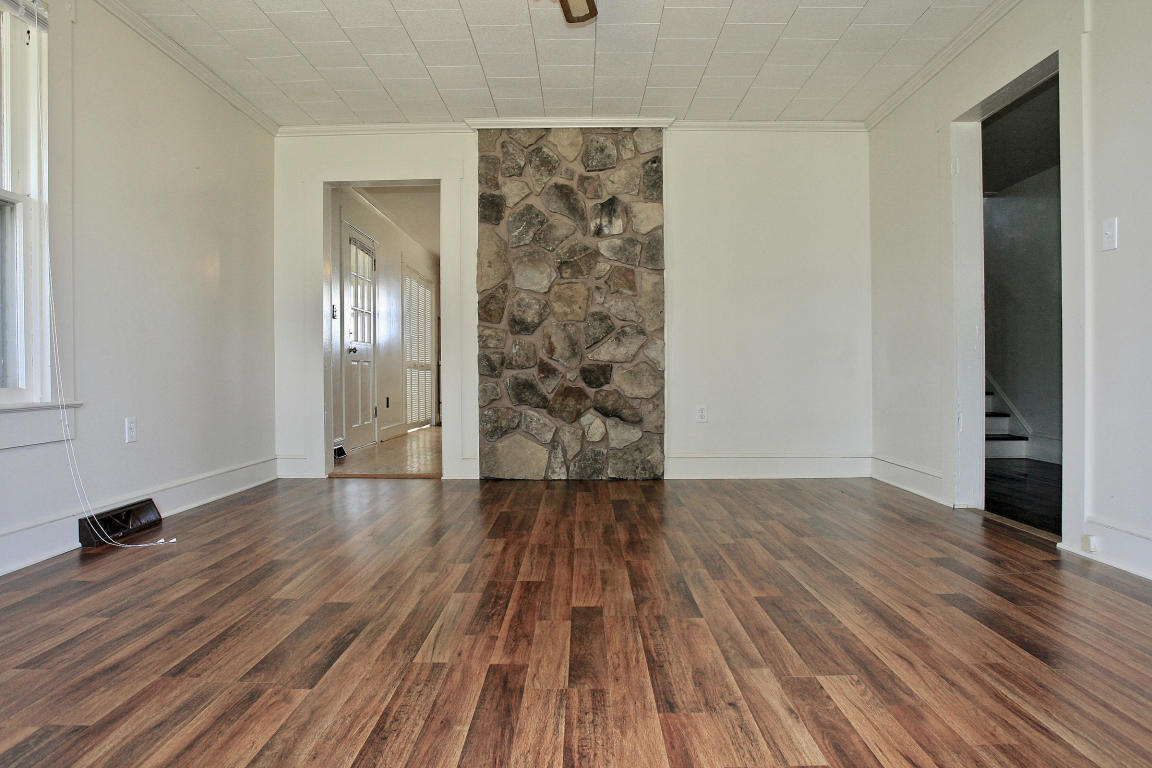 390 Kemp Ford Road Union Hall, VA 24176 - Photo 17 of 47 wooden floor in an empty room with a window