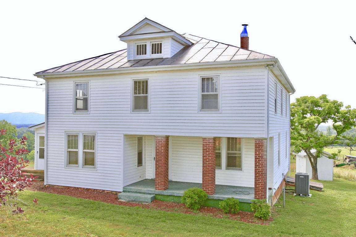 390 Kemp Ford Road Union Hall, VA 24176 - Photo 3 of 47 a front view of a house with a yard
