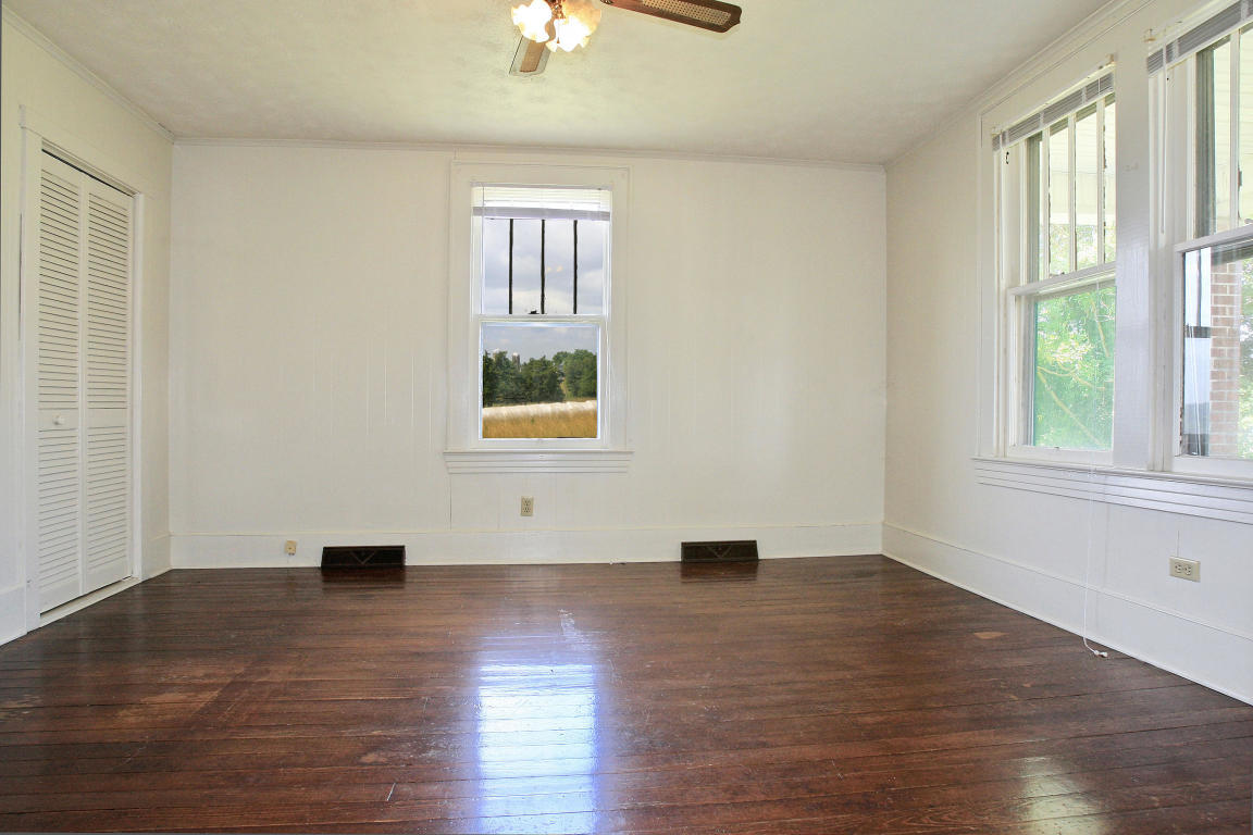 390 Kemp Ford Road Union Hall, VA 24176 - Photo 21 of 47 wooden floor in an empty room with a window